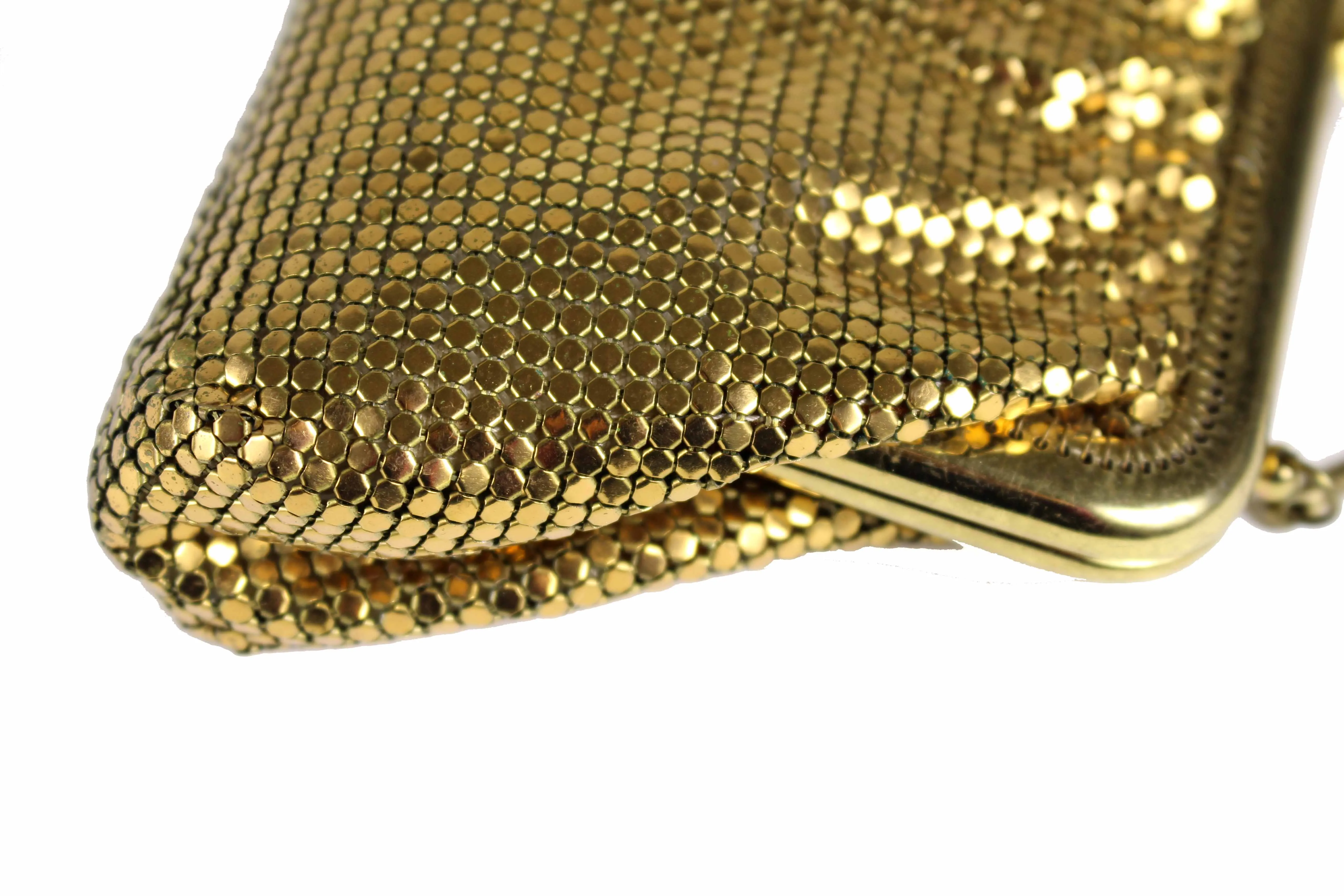 Gold mesh handbag with rhinestone clasp