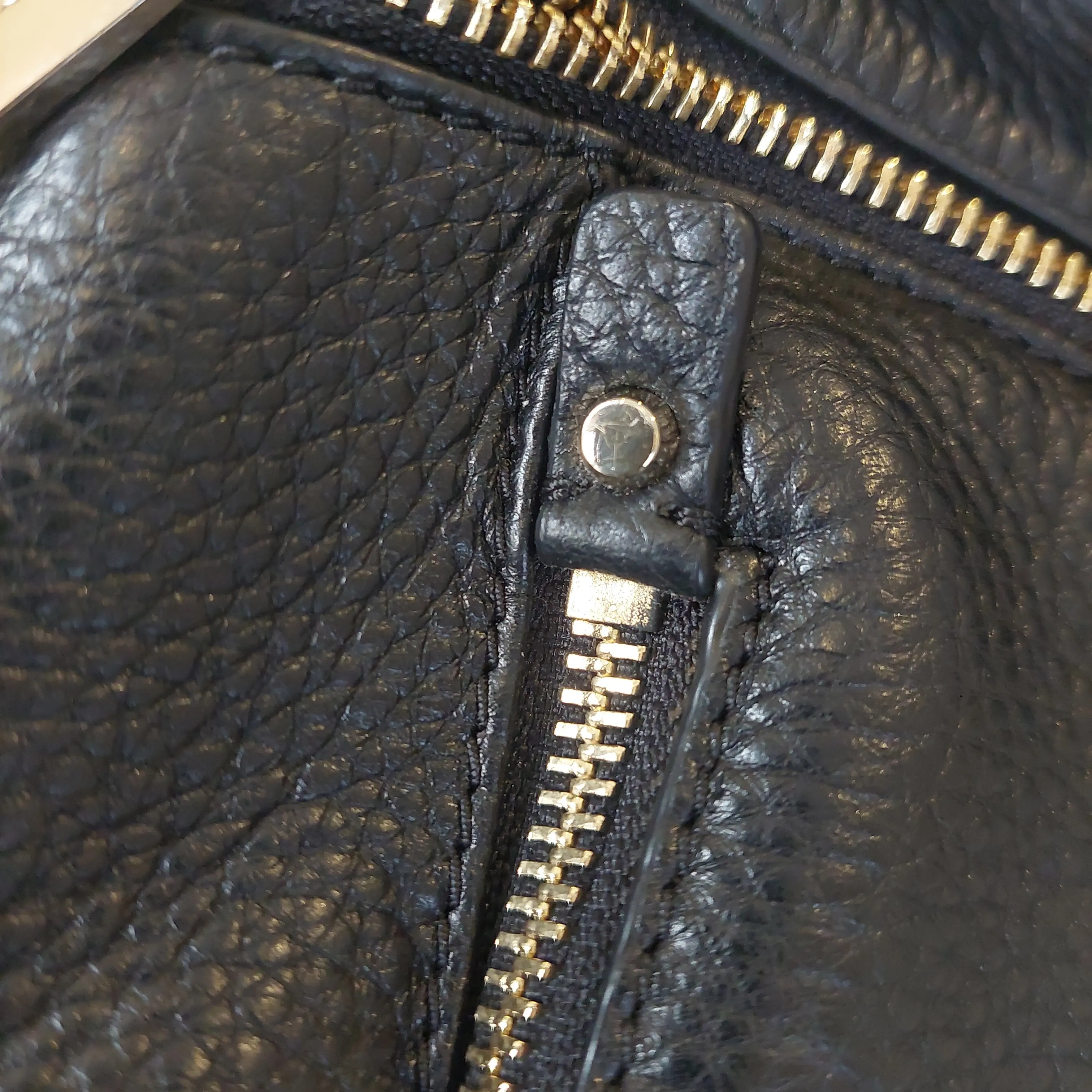 Michael Kors Black Pebbled Leather 'Rhea' Backpack | Gently used |