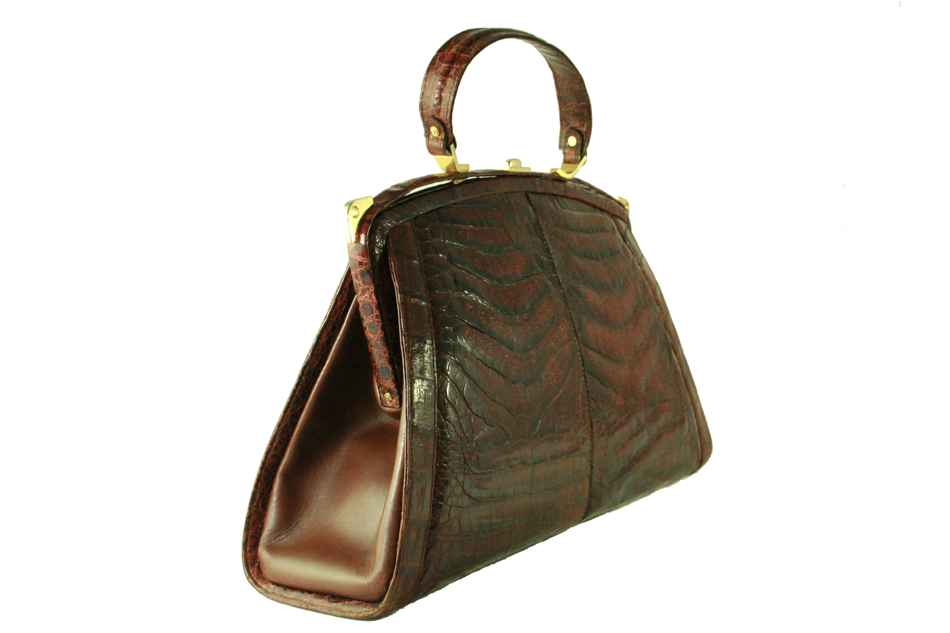 Sizable reddish-brown crocodile skin handbag